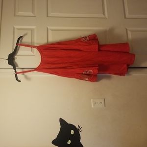 Red dress with butterfly sleeves (sleeves flare out)